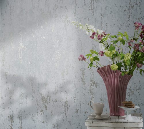 Vilgoskék alapon pezsgő színű beton hatású modern foltos vinyl tapéta