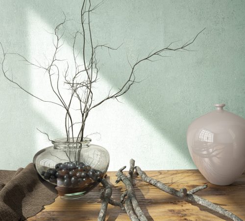 Halványkék, szinte fehér foltos antikolt enyhén ezüstös fémes betonos hatású vinyl tapéta